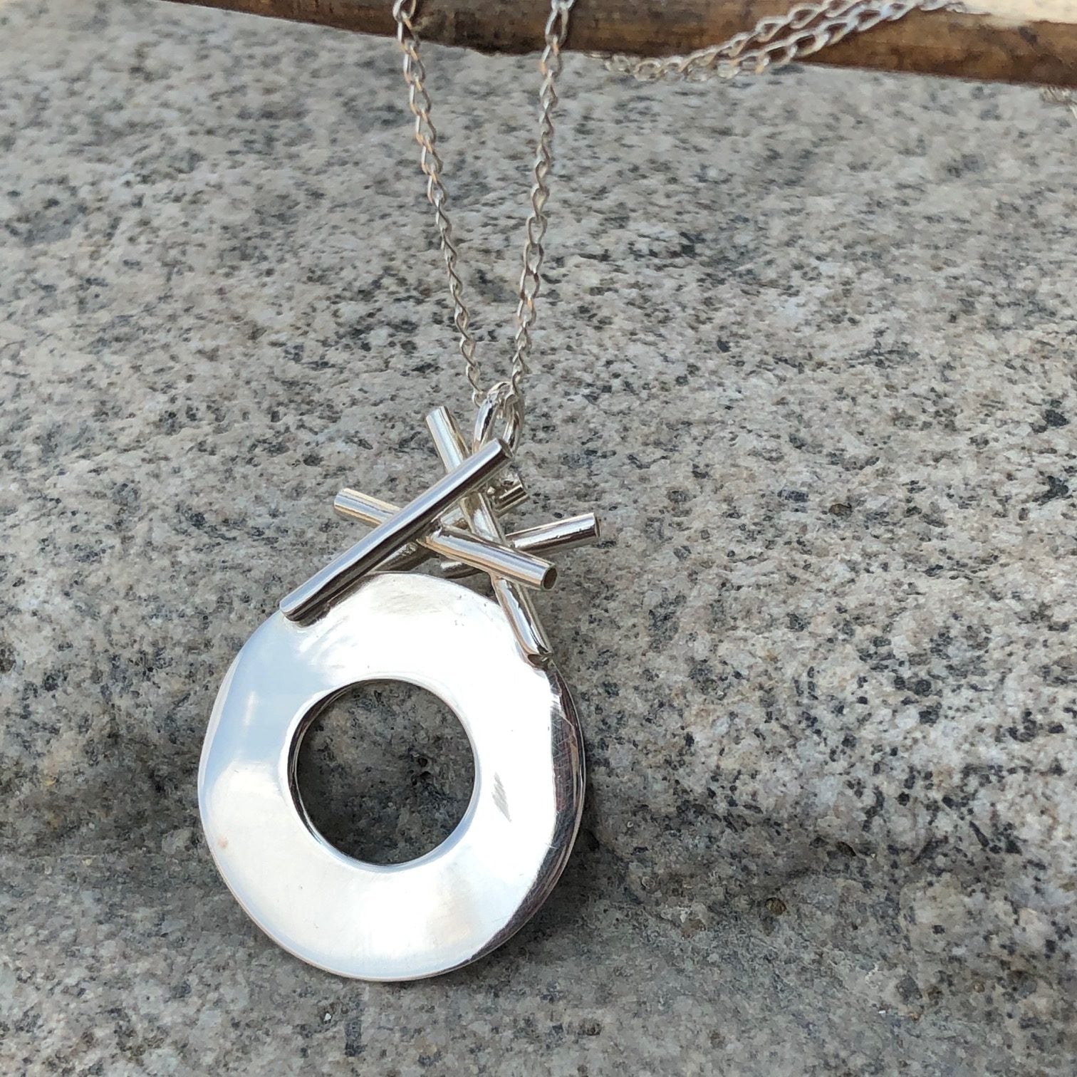 Dije Círculo de Plata