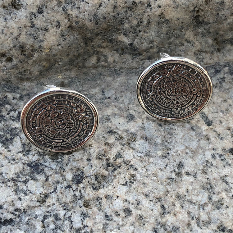 aretes del calendario azteca