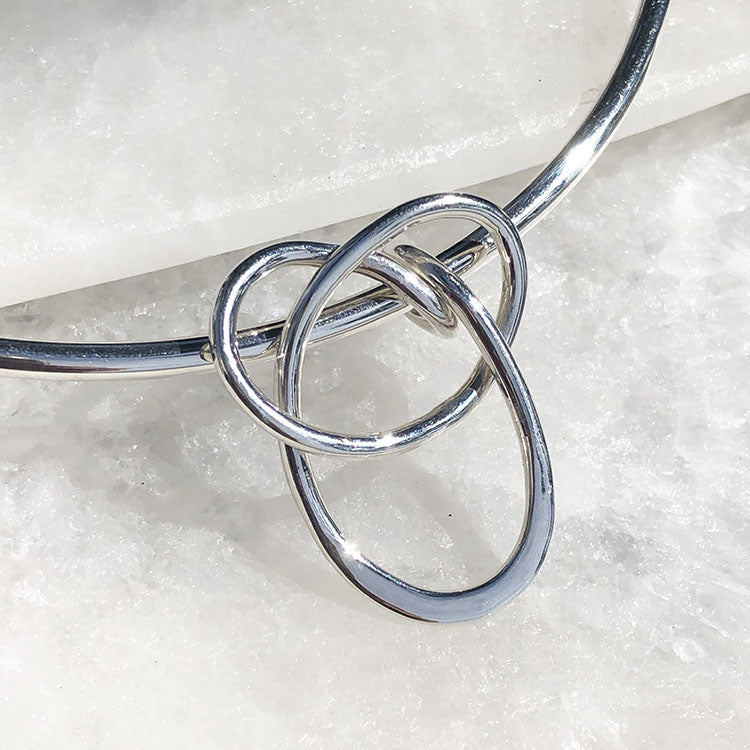 Dije infinito de Plata